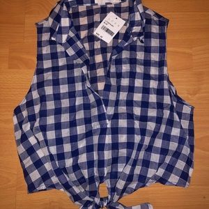 Sleeveless blue plaid shirt w/ cute knot in front